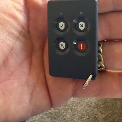 Four-button security key fob supplied with a Durango installation