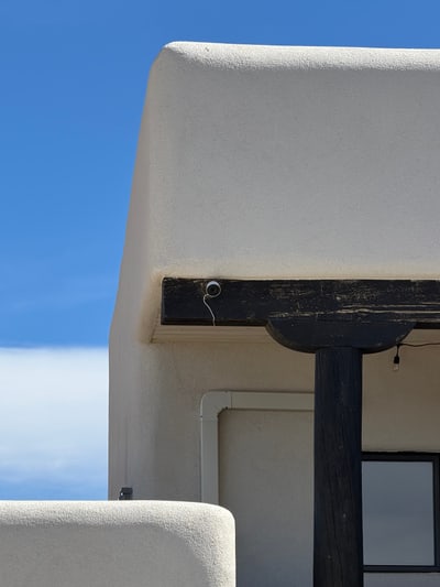Outdoor camera installed beneath an eave in Santa Fe