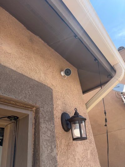 Google outdoor camera installed beneath an eave in Rio Rancho