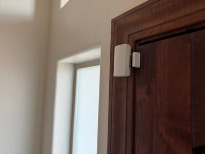 Door sensor installed on a wood entry door in Bosque Farms